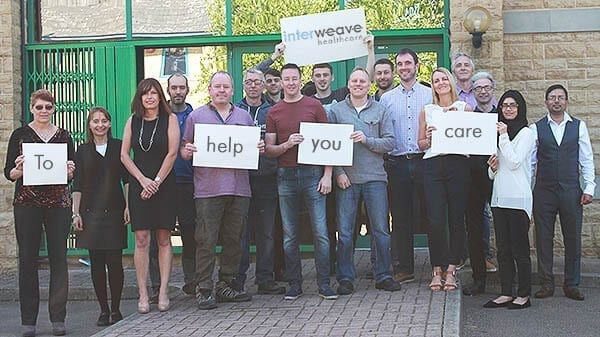 The Interweave team outside Interweave House