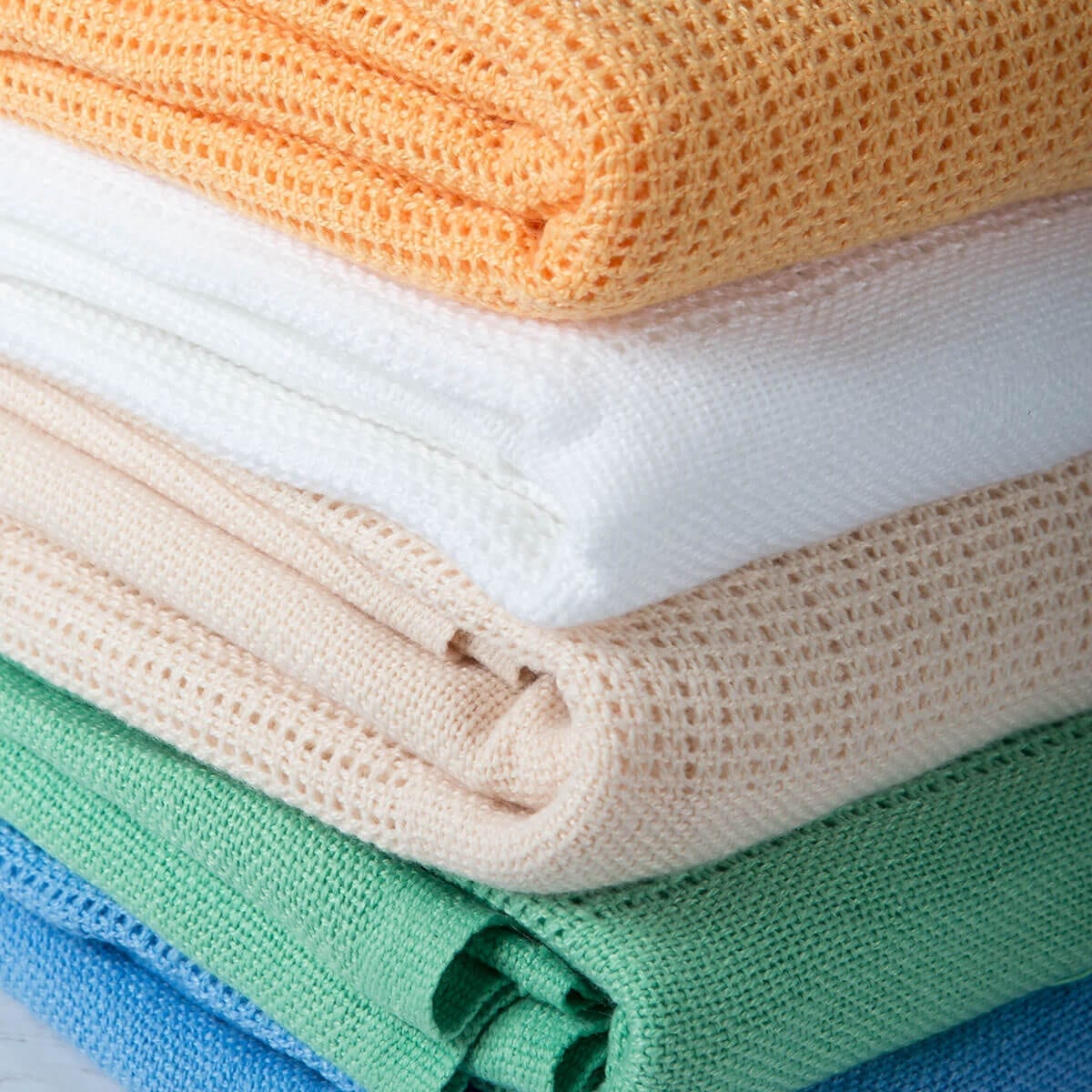 Polyester coloured cellular blankets for single beds Interweave