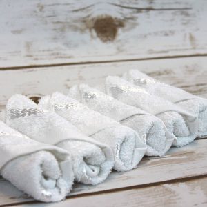 Cold or hot towel set in tray with tweezers