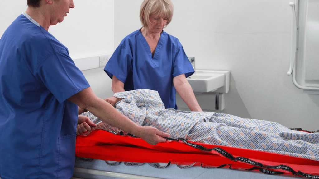 Safety checks on slide sheets with handles