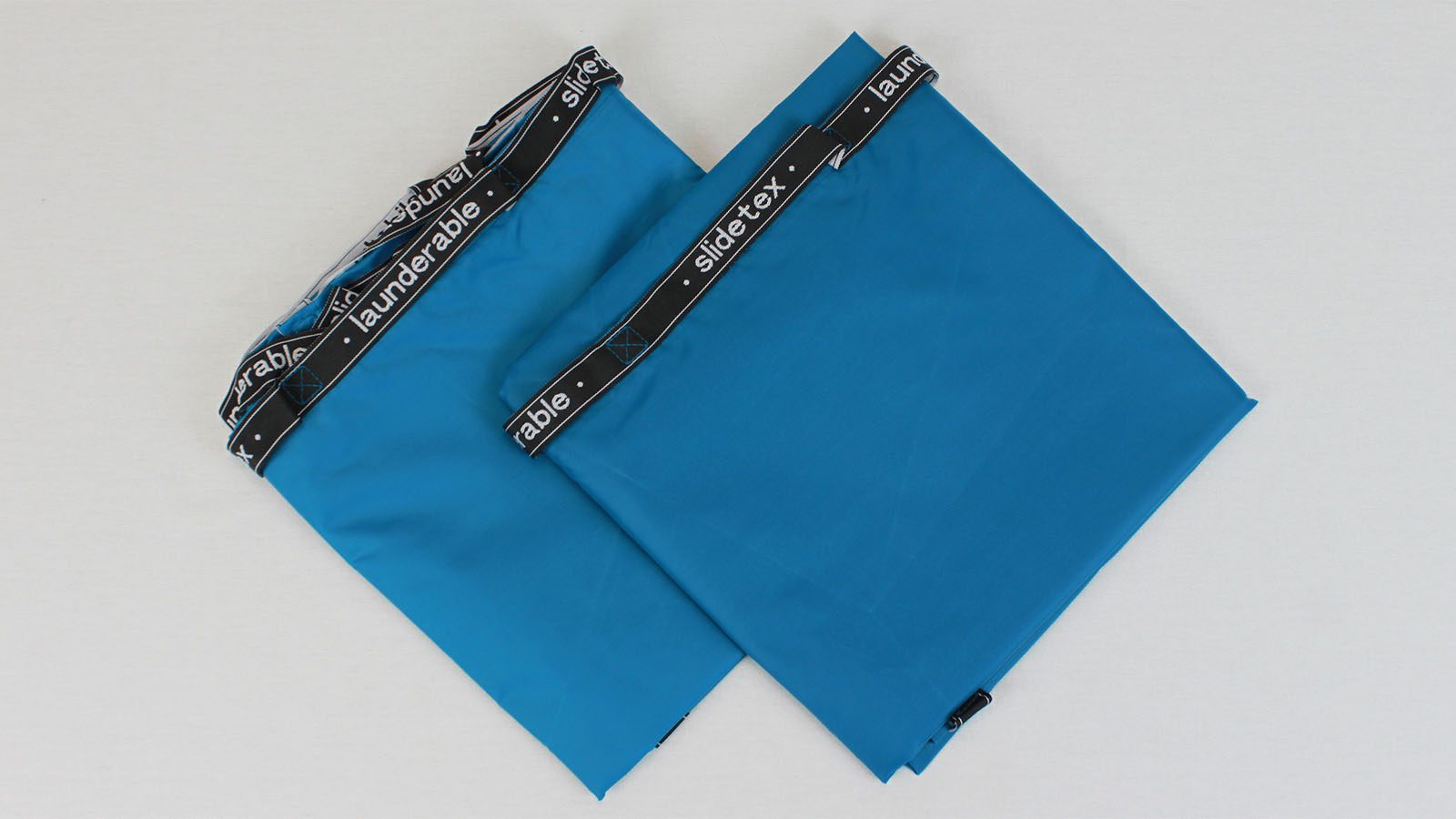 Reusable flat slide sheets with handles